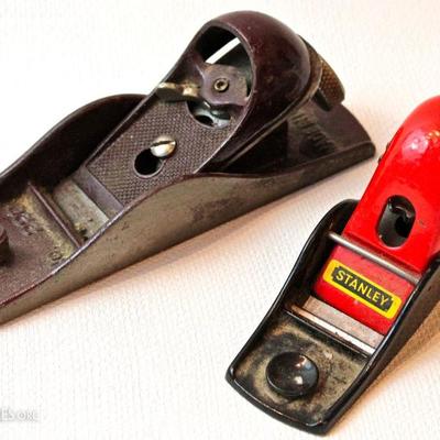 Stanley hand planes, one made in England (red handle)