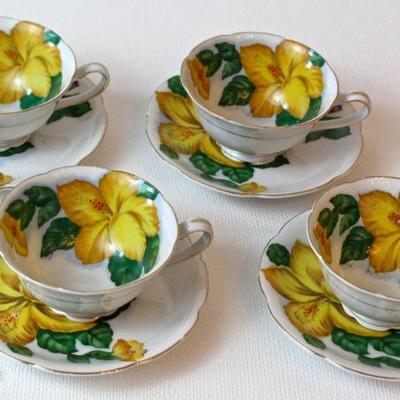 set of 4 hand-painted cups & saucers made in Japan