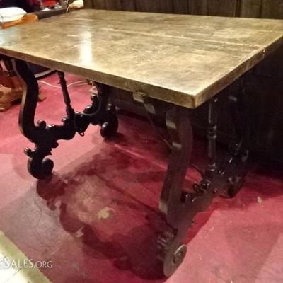 19TH CENTURY WOOD AND IRON TRESTLE LIBRARY TABLE