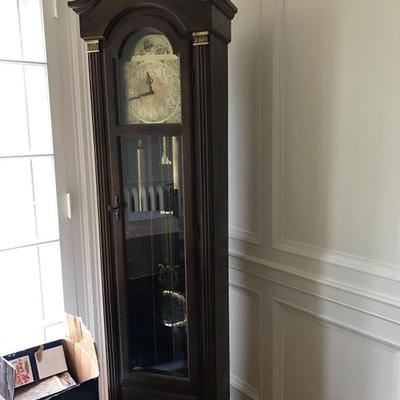 Gorgeous grandfather clock in need of some love to get working again. $400