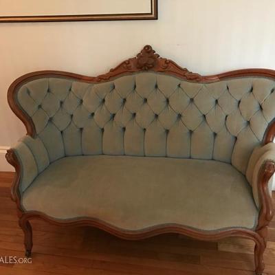Beautiful antique settee with turquoise fabric in great condition. 56