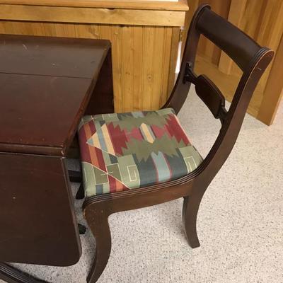 Solid wood and very heavy antique (0ver 70 years old) table with two chairs. Table has some wear and light scratches, but a beautiful...