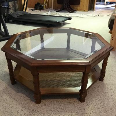 Beautiful glass, wood and basketweave coffee table in excellent condition. 38