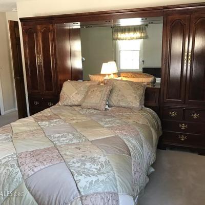 3 piece bedroom set in gorgeous cherry wood including queen bed. Long dresser with mirror is 69