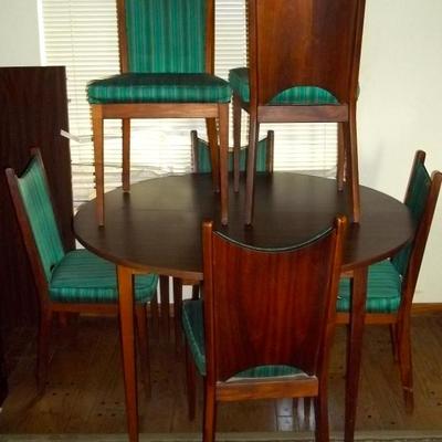 Needs to be reupholstered but what a find.
Six curve back Mid Century Dining Chairs-The chairs are very solid.