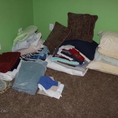 Box lot of linens, pillows, towels, blankets and table cloths
