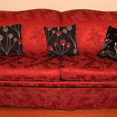 Red sofa, decorative Asian style pillows