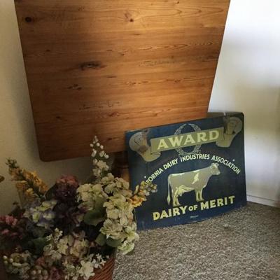 Farm house folding table and 2 sided metal dairy sign. 