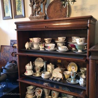 Nice vintage Barrister bookcase by Gunn (missing 1-2 knobs, but good shape otherwise) with collection of antique mostly english bone...