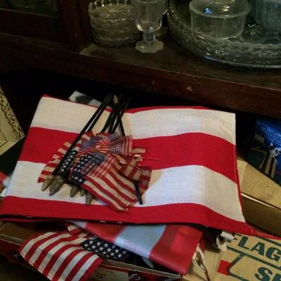 Nice collection of antique and vintage american flags from tiny to large
