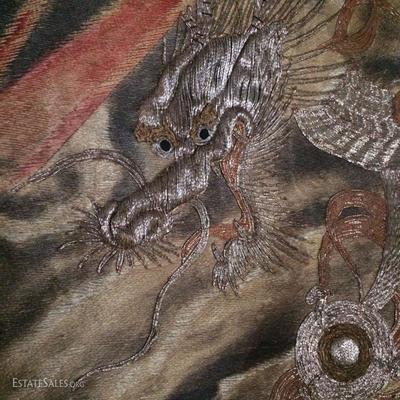 Detail of densely embroidered Chinese dragon tapestry with metallic thread (damaged, but still very cool)