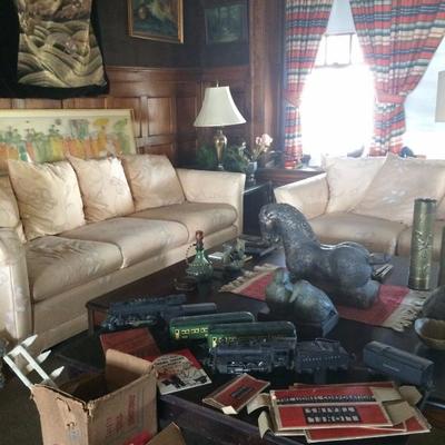 Pre-war Lionel o-guage trains, view of living room furniture and art
