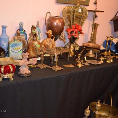 Vintage brass, copper samosas, and liquor bottles