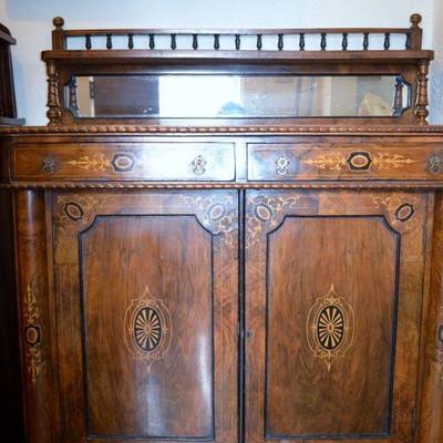 Antique entry console with detailed wood inlays
