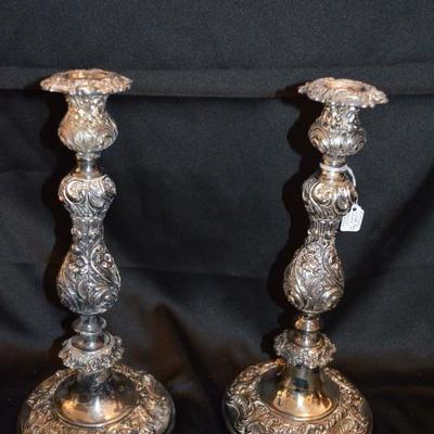 Tall, heavy repousse silver candleholders