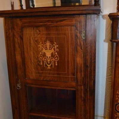 Antique cabinet with inlaid wood