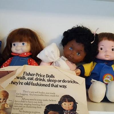 Set of Fisher-Price Dolls from 1970s, featured in the magazine article shown