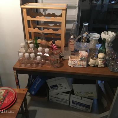 Wine rack, containers, vintage bottles