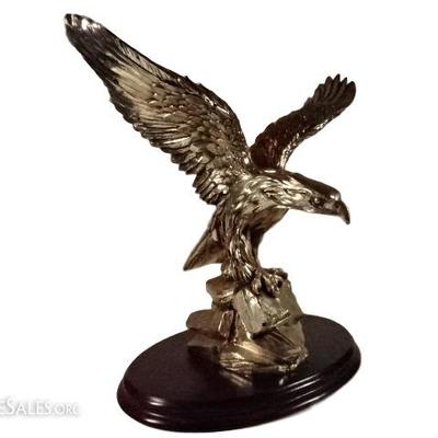 SILVER METAL OVERLAY SCULPTURE OF AN EAGLE