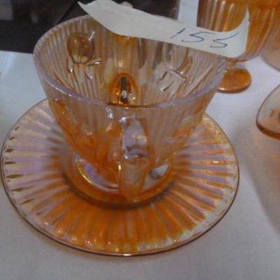 Beautiful orange appears rotted be carnival glass ..check out the others we have 
