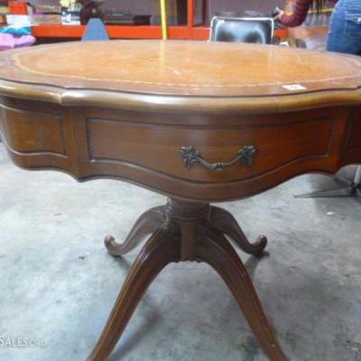 Antique tooled leather gold drum table