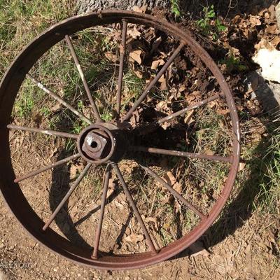 two of theses iron wheels