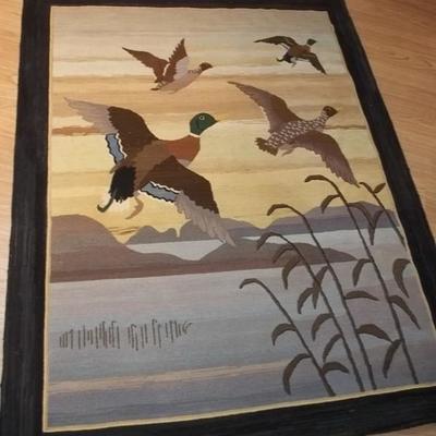 two hand hooked rugs Grenfell Labrador Industries made in Newfoundland and Labrador