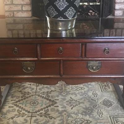 Matching wood Asian Smaller size coffee table with glass top