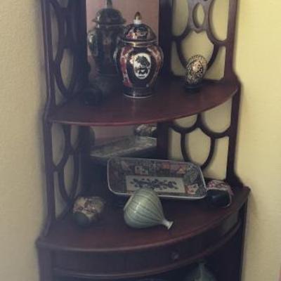 Corner wood collectibles shelf