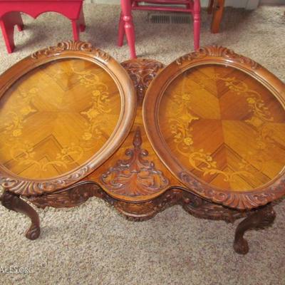 antique carved coffee table with glass tray top