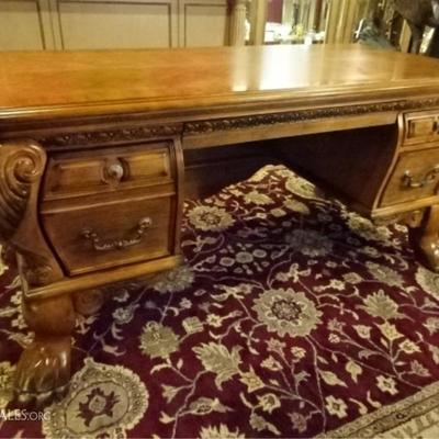 Michael Amini executive desk with 5 drawers and 2 cabinets, with carved lion's paw feet