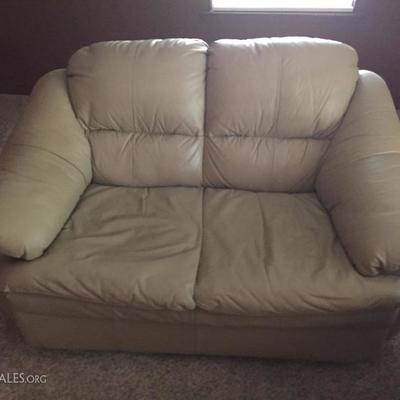 Two piece leather living room - love seat and couch