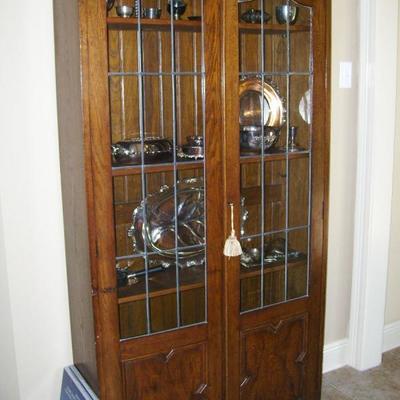Edwardian oak cabinet with leaded glass doors and original key