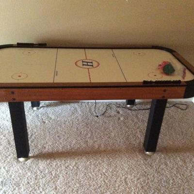 Air hockey table with supplies, $100.