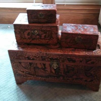 Set of 4 Japanese hand carved antique chests.