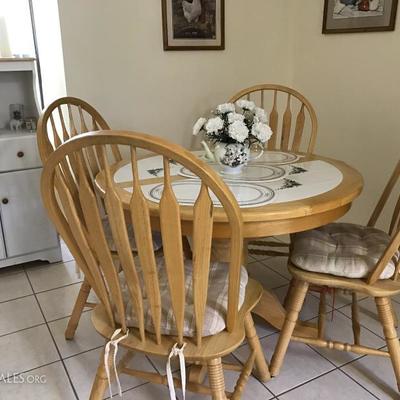 Nice tile top kitchen set with four chairs  42