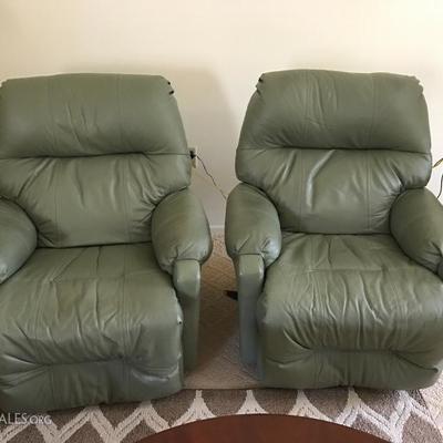 Matching leather rocker recliners 