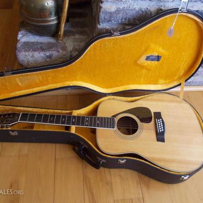 1980's Yamaha 12 string acoustical guitar with case in like new condition $265
