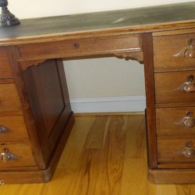 Victorian executive's desk with inlaid leather and hand carved pulls $295
51 X 26 1/2 X 30