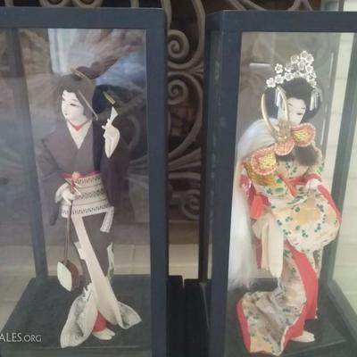 Geisha dolls in display cases