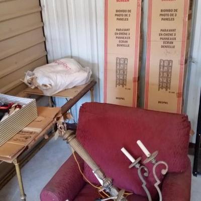 folding screens new in box, upholstered chair and ottoman, multiple chandelier some still in boxes