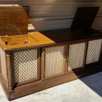 Magnovox cabinet with record player and eight track player