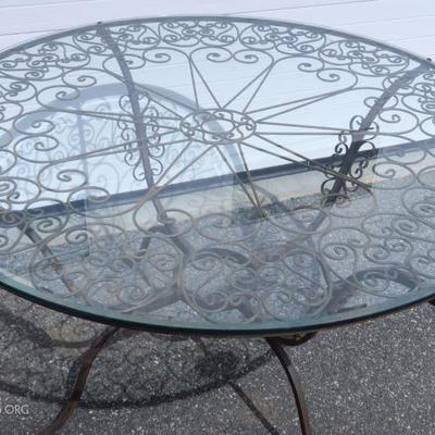 Detail-Elegant beveled glass wrought iron dining table 