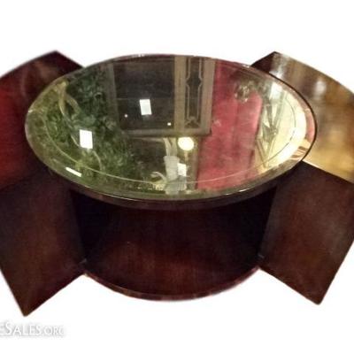 BARBARA BARRY STYLE COFFEE TABLE, SILVER GILT BACK MIRRORED ROUND TOP, DARK FINISH, EACH END WITH 2 