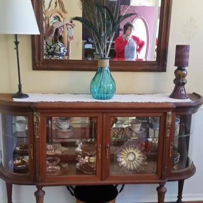 Antique wood and glass buffet.  Beautiful piece.  This items is priced at $250.00.  Will entertain reasonable offers