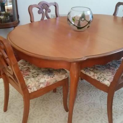 This is a solid maple table with 4 chairs.  This price on this item is listed at $200.00.  