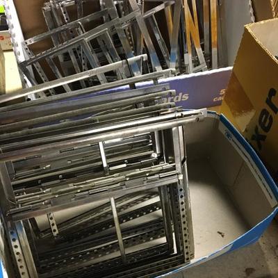 Stainless steel darkroom hangers for repurposing as frames