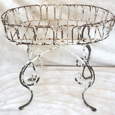Lot 273 - Antique French Wrought Iron Ornate Plant Stand. With remnants of the original white paint. A elegant addition to any porch,...