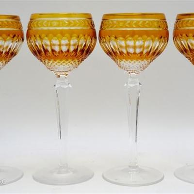 Lot 177 - Set of 4 Matching Wedgwood Crystal Crown Amber Yellow Cut To Clear Crystal Wine Hocks. All are signed. A hard to find color....