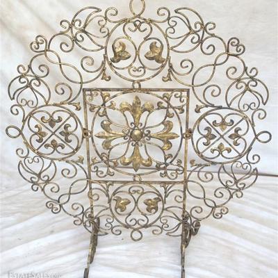 Lot 311 - Gilded Cast Iron Screen for Fireplace or as a Decorative Accent. Measures 38